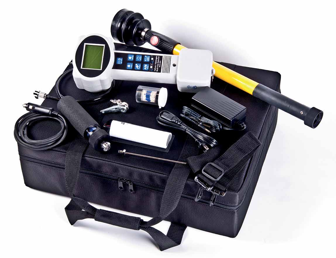 black pelican case with the MGD-2002 leak locator instrument on top with a variety of cords and cables.
